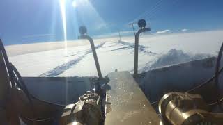 Snowplowing View from a Road Grader