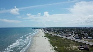 See what it’s like in Galveston this morning as beachgoers head out