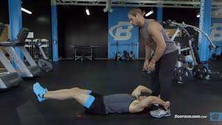 Partner Lying Leg Raise With Throw Down Exercise Videos & Guides Bodybuilding com
