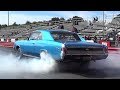 Insane Burnout !! 1970 Camaro SS396 vs 1967 Chevelle SS396 - 1/4 mile Drag Race Video - Road Test ®