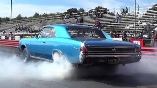 Insane Burnout !! 1970 Camaro SS396 vs 1967 Chevelle SS396 - 1\/4 mile Drag Race Video - Road Test ®