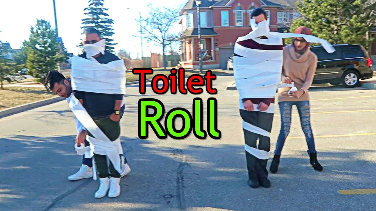 COVERED IN ROLLS of TOILET PAPER