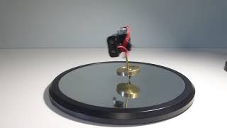 Battery Mounted Spinning Top Rises in 0:03. Top is 70.28 g. Battery is 91.30 g / 129.91% of Top (2)