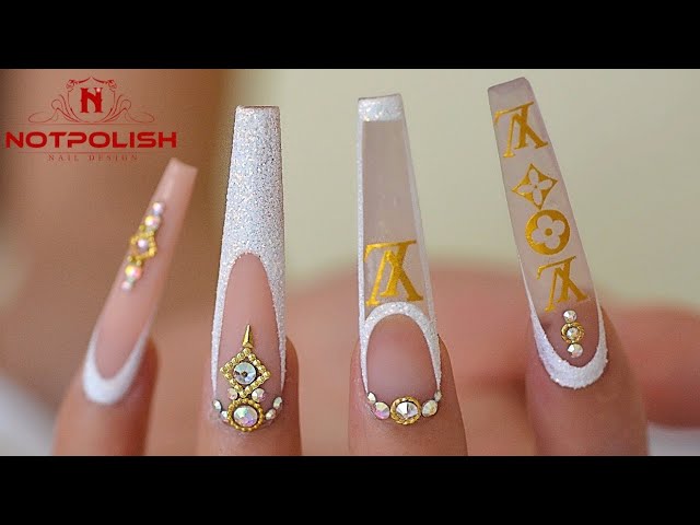 LV nails  Nails design with rhinestones, Acrylic nails, Bandana nails