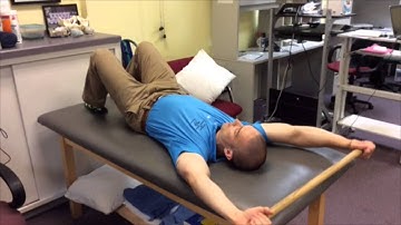 MovementProfessional.com: Supine Shoulder Flexion with Dowel
