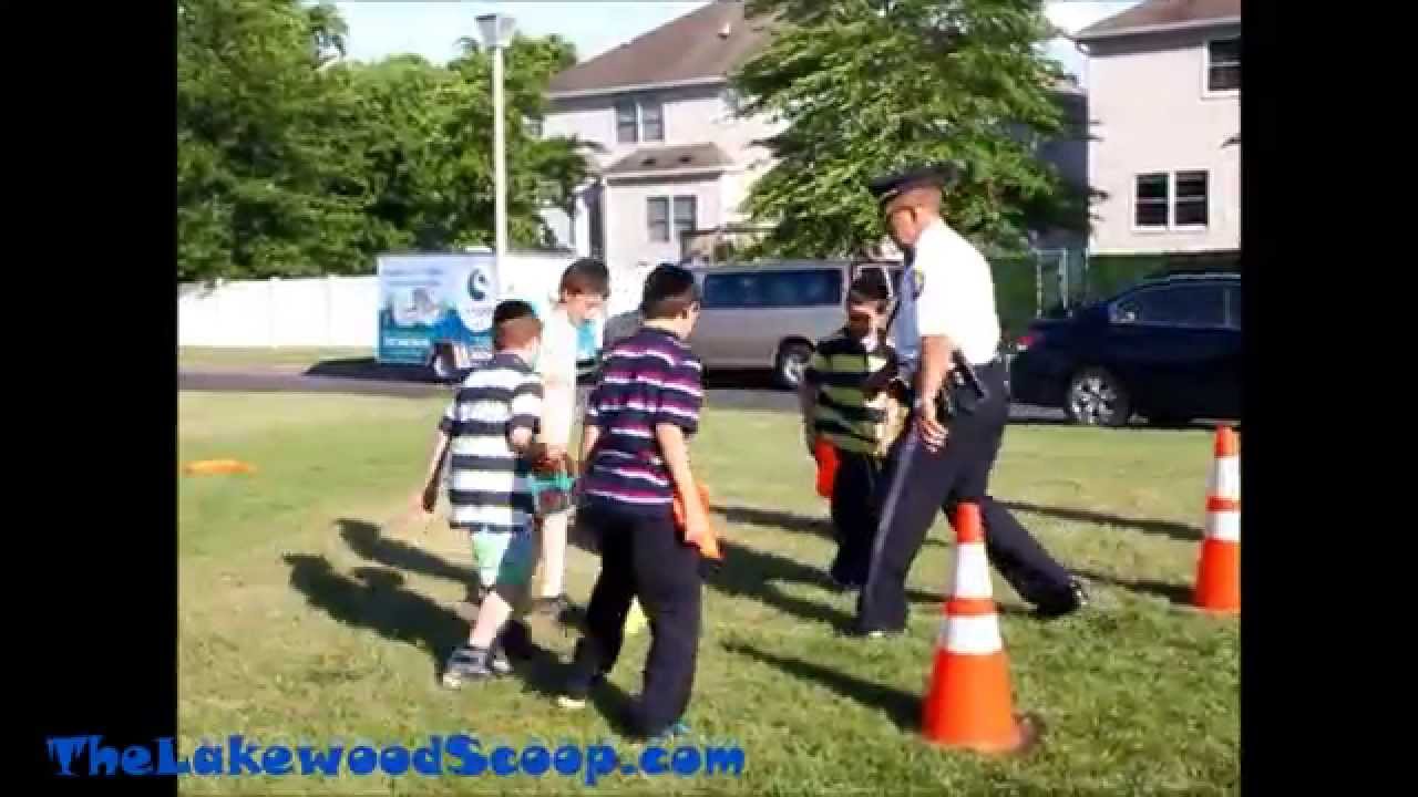 LPD Playing Soccer with Lakewood Children
