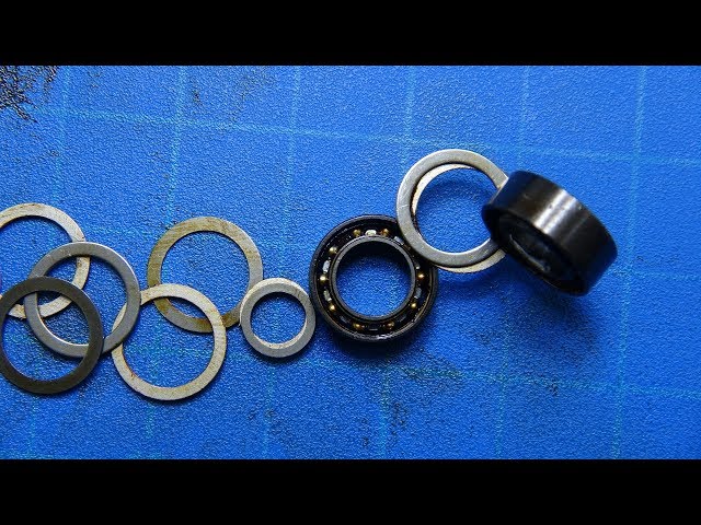 Daiwa's Magnetically Sealed ball bearings. Putting them back together and  applying the magic oil 