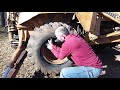 Showing How Easy it is to Change a Backhoe Tire Tube