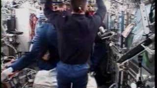 STS-117: Hatch Opening and Crew Greeting
