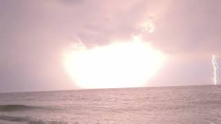 Summer Heat Lightning Storm over the Atlantic Ocean seen from Breezy Point Queens New York City USA