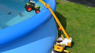 Bruder Toys Scania Liebherr  crane truck Rescue the sunken tractor Claas our pool.