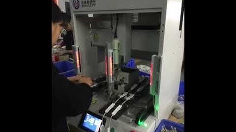 Automatic screw fastening robot to lock the screws for LED products. SC-180II with safety cover