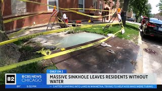 Massive sinkhole leaves condo residents without water
