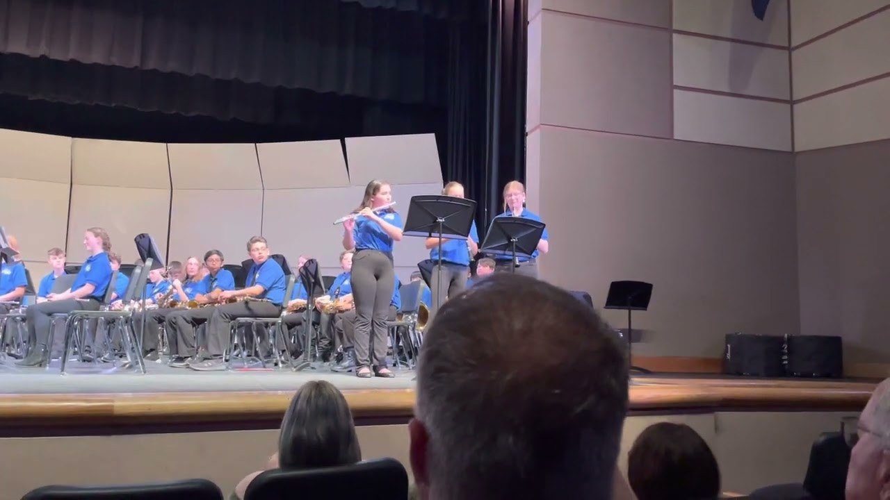 Three band students casually rickroll hundreds of parents