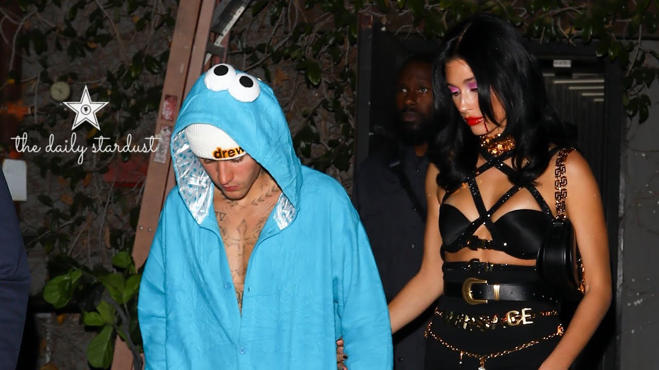 Justin Bieber & Hailey Bieber Dress Up As Cookie Monster And Versace Vampire While Partying In LA