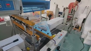 Automatic foam box sealing shrink wrapping machine