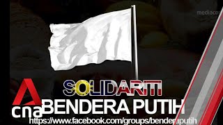 COVID-19: Malaysians fly white flags for help amid protracted lockdown
