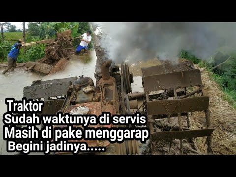 Video: Bagaimana Anda membebaskan mesin traktor yang macet?