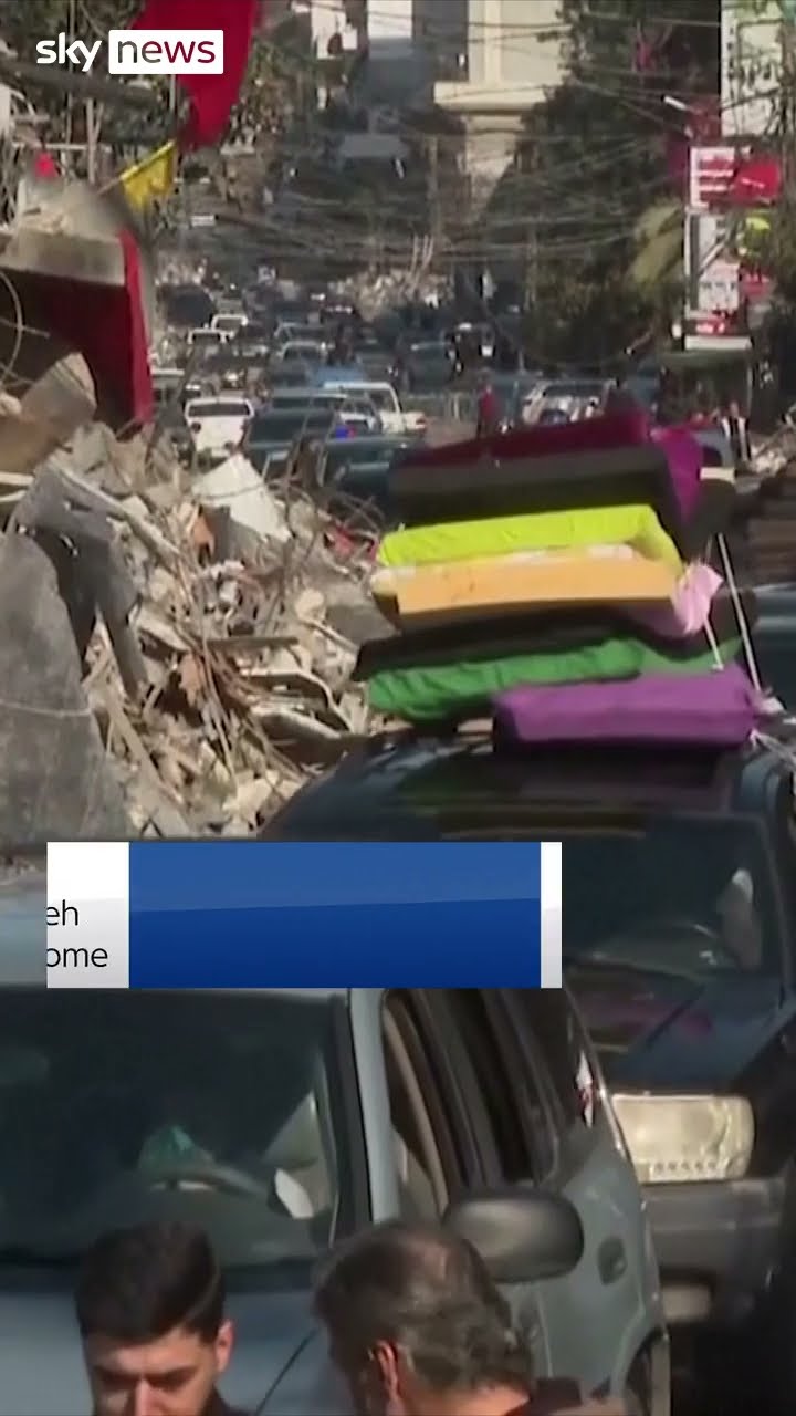 Displaced people return to destroyed city