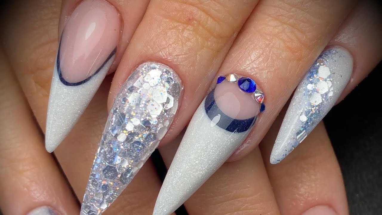 Acrylic nails - blue & white design set with glitter & crystals