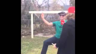 Guy jumps over table and gets the ping pong ball in the cup - Beer Pong Dunk