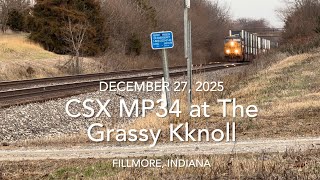 Saturday afternoon at The Grassy Knoll, CSX MP34, we watch a fast double-stack train heading west.