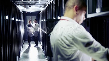 Team Of It Engineers Working In A Data Centre. Stock Footage