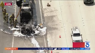 Car-hauling semis burns on 118 Freeway