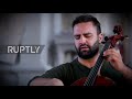 Nagorno-Karabakh: Cellist Sevak Avanesyan performs in destroyed Ghazanchetsots Cathedral in Shusha