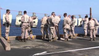 130906-M-BS001 Flight Deck Pistol Qualification