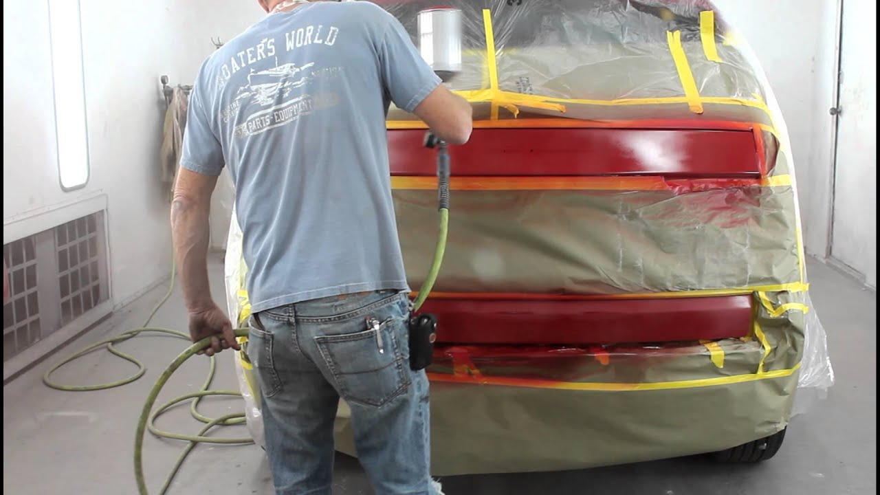 Nashville auto body collision repair applying paint after sanding