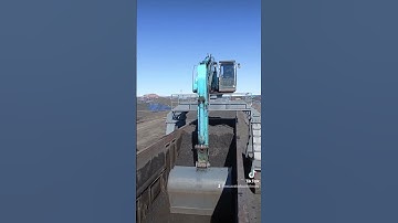 Straddle excavstor unloading gravel railcars.#excavator #heavyequipment #funny #satisfying