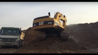 Caterpillar 365B LME Excavator Loading Mercedes Actros Trucks y