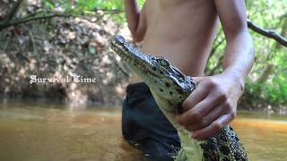 Primitive Technology: Catch Crocodile in river - Cooking crocodile for food eating delicious