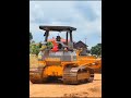 The dozer travels fast, pushing the soil quickly.