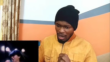 African_🇨🇲 reacts to AC_DC - Thunderstruck (Official Video)