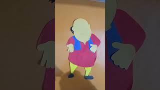 Cartoon character Motu with craft paper