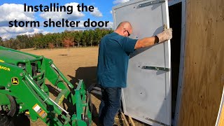 #213 Installing the Tornado/hurricane shelter bunker door! Storm shelter bunker build #13