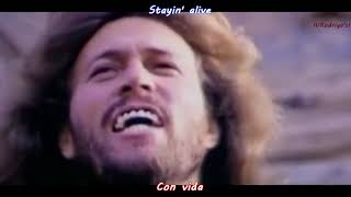 Bee Gees - Stayin' Alive [Lyrics Video oficial Subtitulos en Español] Resimi