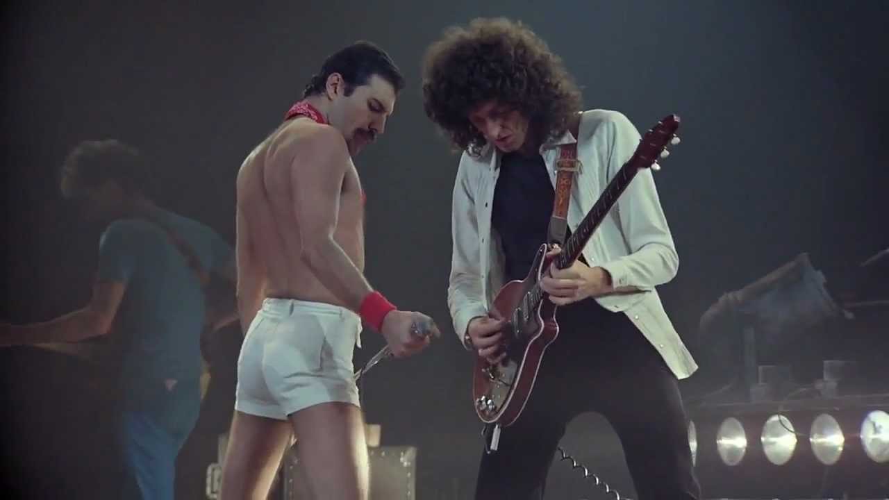 Слушать рок ю. Queen we will Rock you 1977. Фредди Меркьюри 1981. Queen Rock Montreal Queen обложки. Концерт Queen we will Rock you.