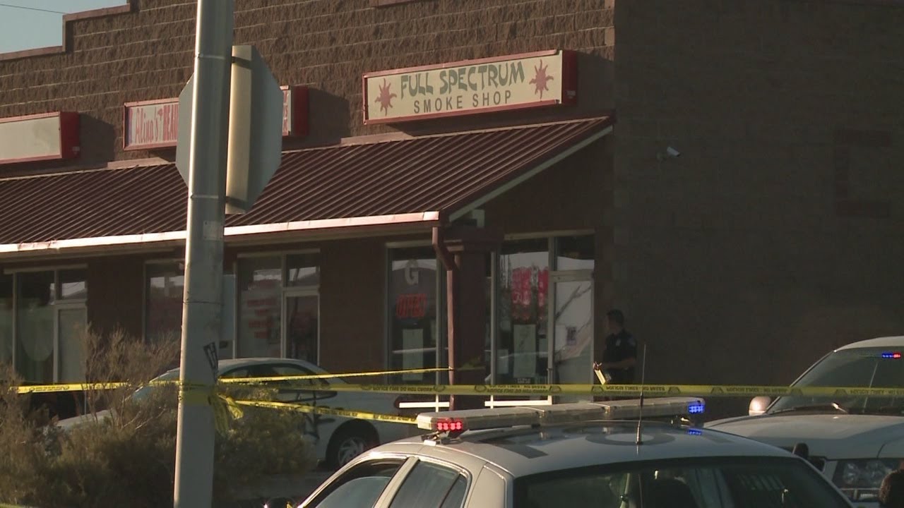 Dead robber's widow sues shop clerk