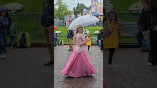 Disneyland Paris, Disney Princesses, take cover in this weather! Aurora and Cinderella