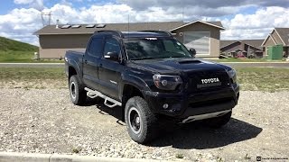 Lifted 2013 Toyota Tacoma Double Cab on 265/75R16 Tires