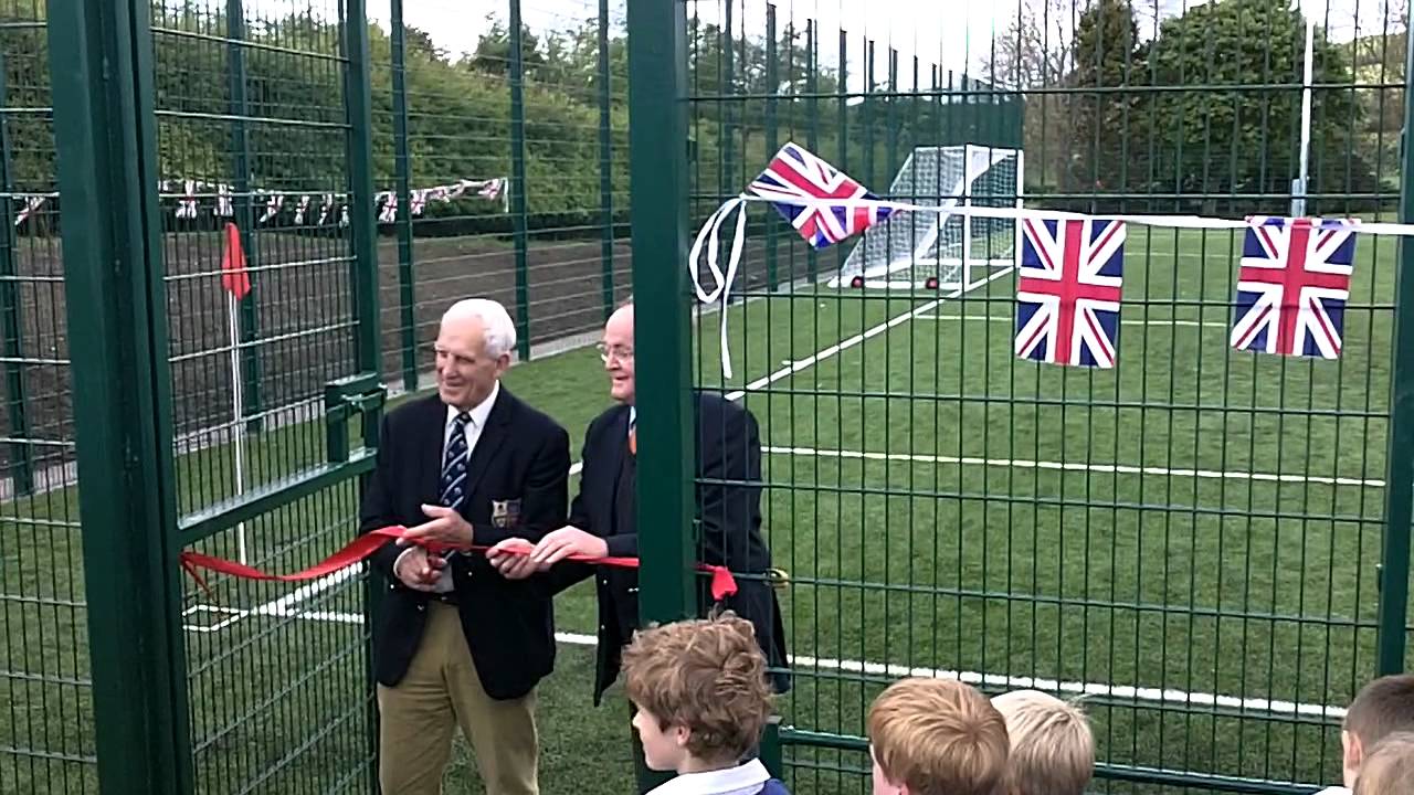 Dave Rollo Cutting Ribbon of New Duffus Park Football Pitch