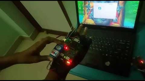 Hand data glove- A wearable real time device for human computer interaction