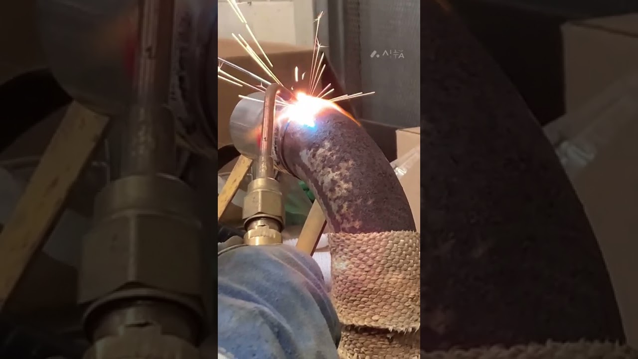 Torch welding exhaust pipe