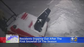 Residents Dig Out After Season's First Big Snowfall