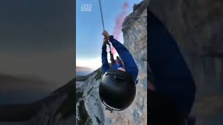Base Jumper Swings From Another Base Jumper skydiving shorts jump
