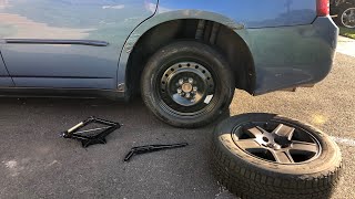 How to change flat tire  wheel removal and donut / spare install  MUST WATCH For Every Car Owner