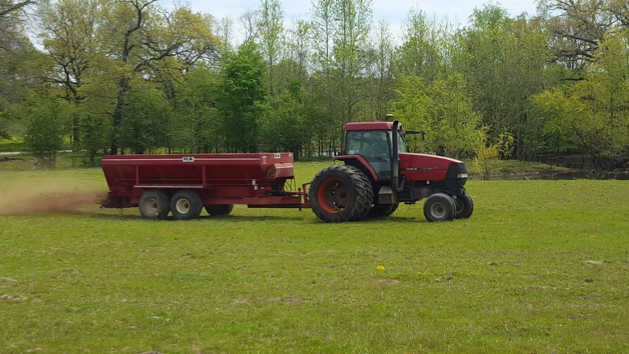 Spreading chicken litter YouTube
